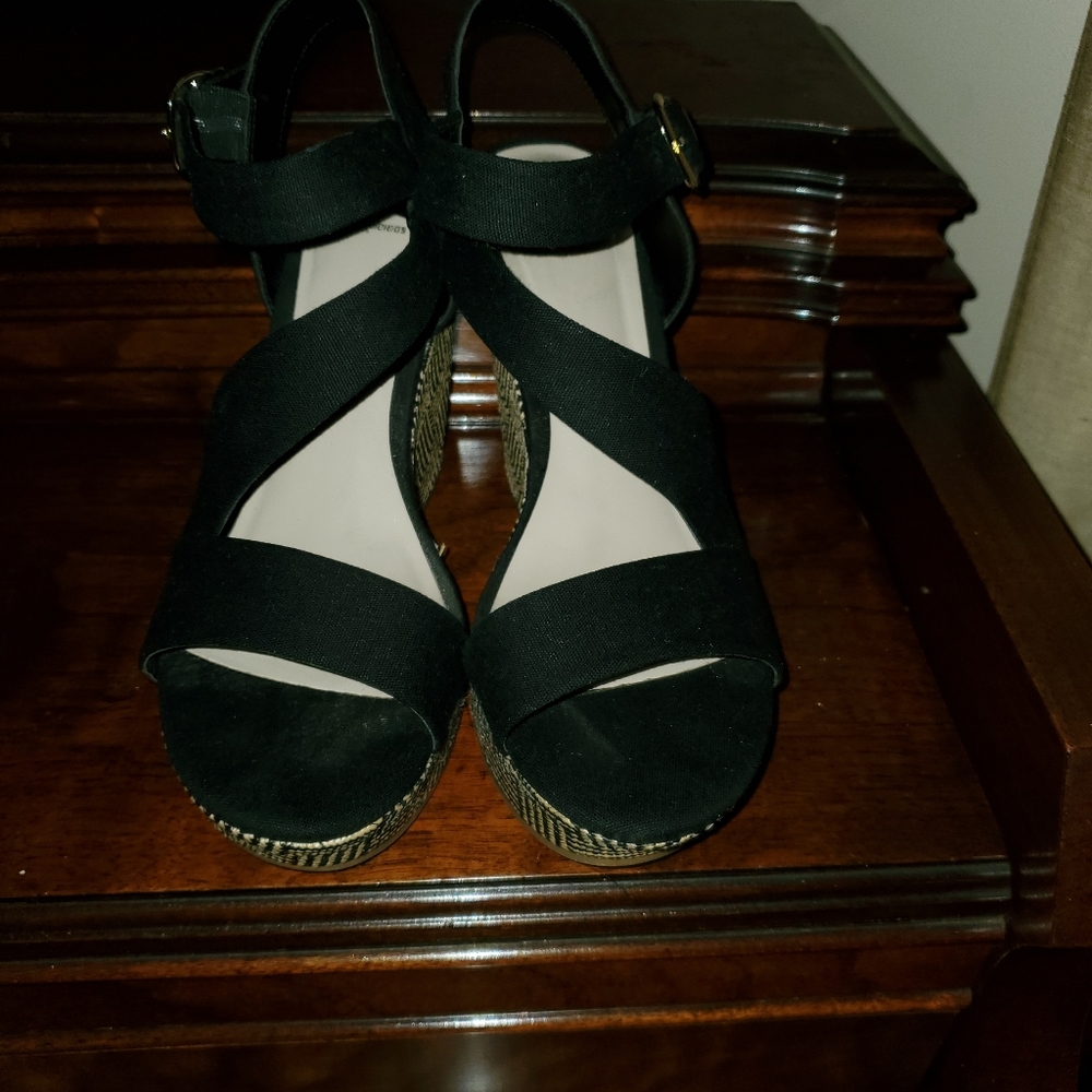 Black wedge heels.